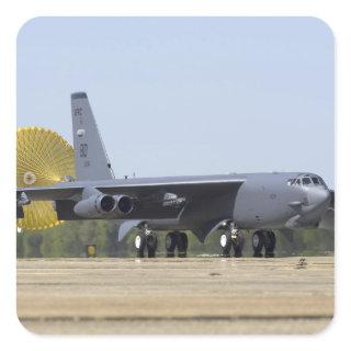 A B-52 Stratofortress deploys its drag chute Square Sticker