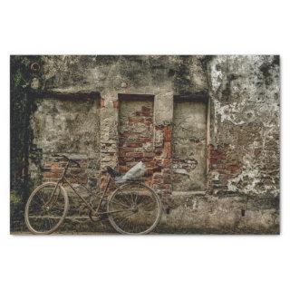 A Bicycle Resting on a Weathered Brick Wall Tissue Paper