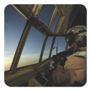 A C-130 Hercules pilot scans the horizon Square Sticker