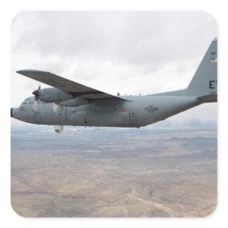 A C-130 Hercules soars through the sky Square Sticker