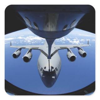A C-17 Globemaster III receives fuel Square Sticker