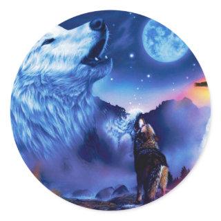 A pack of wolves on a dark night classic round sticker