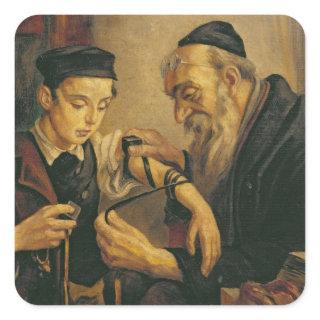 A Rabbi tying the Phylacteries to the arm of a boy Square Sticker