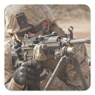 A squad automatic weapon gunner provides securi square sticker