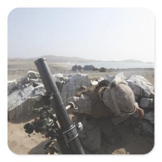 A US Marine fires a mortar in Salinas, Peru Square Sticker