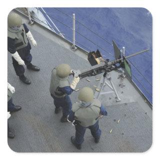 A US Sailor fires a 50-caliber M2HB Square Sticker
