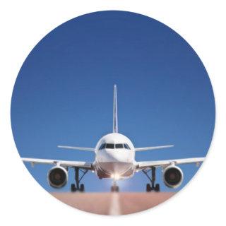 AIRPLANE LINED UP ON THE RUNWAY CLASSIC ROUND STICKER