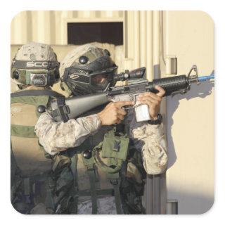 An infantry scout aims his weapon square sticker
