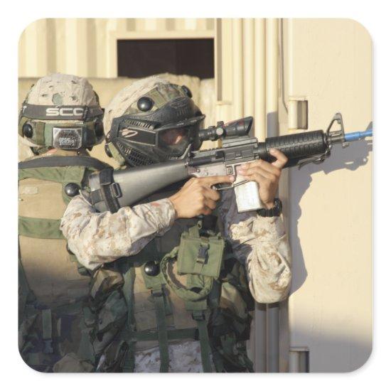 An infantry scout aims his weapon square sticker