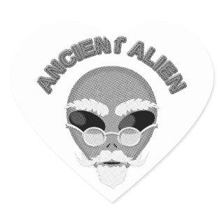 Ancient Alien Head Newsprint Heart Sticker