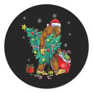 Bigfoot Carrying Christmas Tree Lights Xmas Sasqua Classic Round Sticker