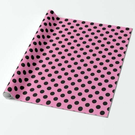 Black polka dots on pink