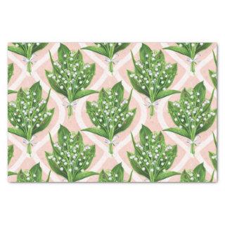 Bouquet of lilly of the valley flowers on pink tissue paper