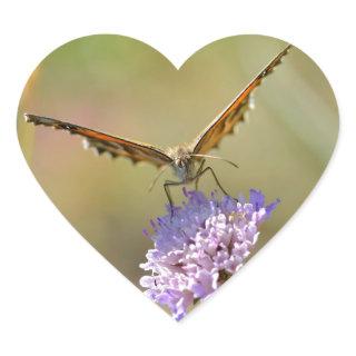 Butterfly on flower heart sticker