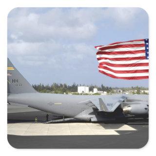 C-17 Globemaster III sits on the flightline Square Sticker