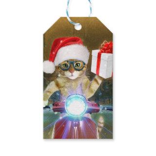 Cat in the Santa Claus hat delivers Christmas gift Gift Tags