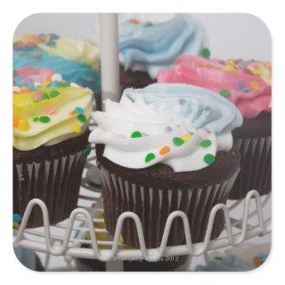 Chocolate cupcakes on a cake stand 2 square sticker