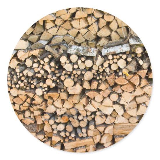 Chopped wood on a pile round sticker