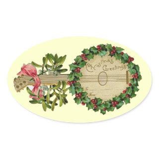 CHRISTMAS BANJO WITH MISTLETOES AND HOLLY BERRIES OVAL STICKER