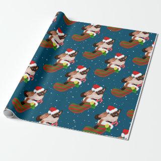 Christmas siamese cats with stocking and Santa hat