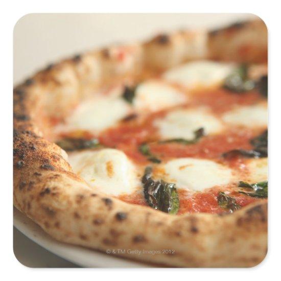 Close-up of a whole pizza pie square sticker