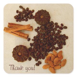 Coffee beans, almonds, cinnamon and cookies square sticker