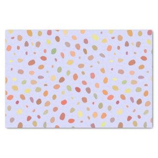 Colorful art dots on pale blue tissue paper