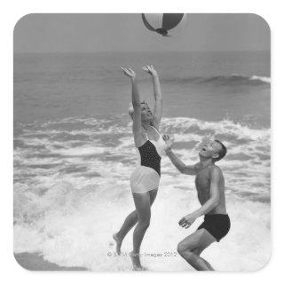Couple Playing with a Beachball Square Sticker