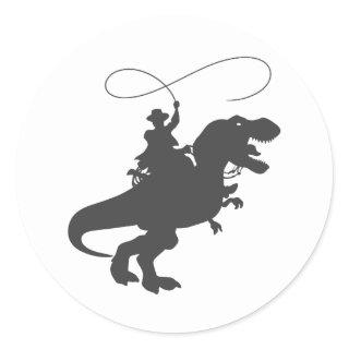 Cowboy riding dinosaur in the prehistoric era classic round sticker
