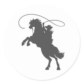 cowboy throwing lasso riding rearing up horse classic round sticker