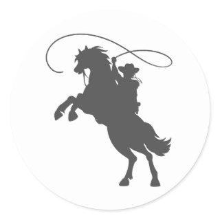 cowboy throwing lasso riding rearing up horse classic round sticker