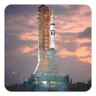 Dawn breaks behind ASTP Saturn IB CDDT Square Sticker