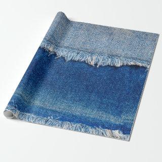 Denim jeans background. Ripped denim fabric with b