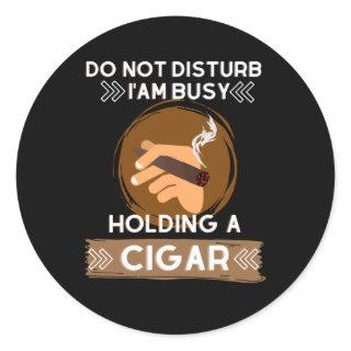 Do not Disturb I am busy holding a Cigar Classic Round Sticker