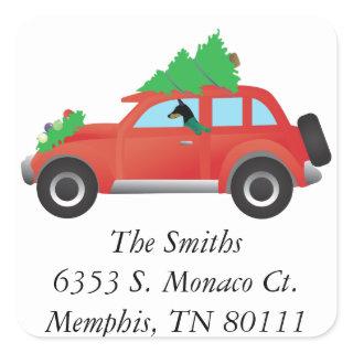 Doberman Pinscher driving car w/ Christmas tree Square Sticker