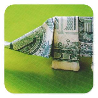 Dollar bill origami Elephant on Green background Square Sticker