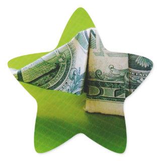 Dollar bill origami Elephant on Green background Star Sticker
