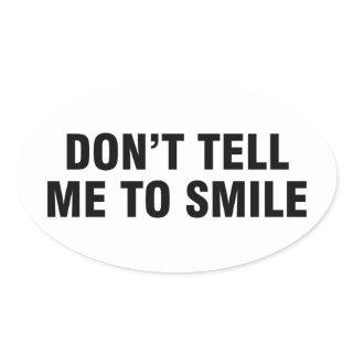 Don’t tell me to smile oval sticker