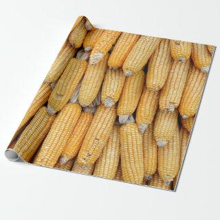 Dried corn that was stacked .