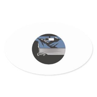 Driver Looking Mountain Pass Oval Woodcut Oval Sticker