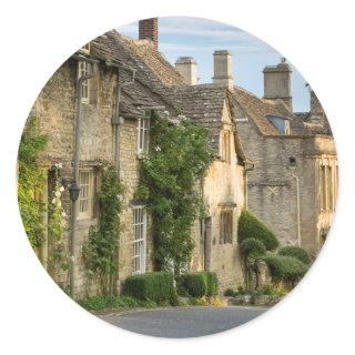 Early morning over connected cottages classic round sticker