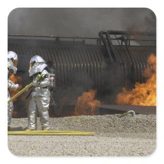 Firefighters neutralize a live fire square sticker