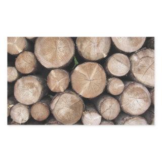 Firewood pile stacked . Woodpile of round logs Rectangular Sticker