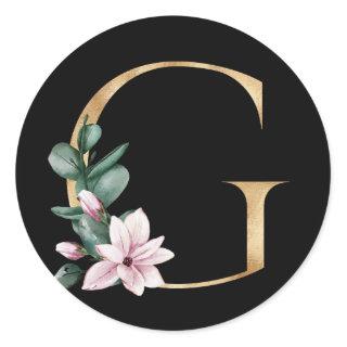Floral magnolia monogram in gold letter G Classic Round Sticker