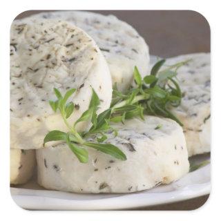 French goat cheese - chevre - with herbs on a square sticker