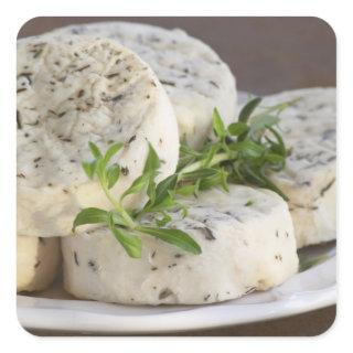 French goat cheese - chevre - with herbs on a square sticker