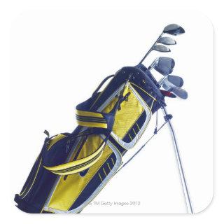 Golf bag with clubs on white background square sticker