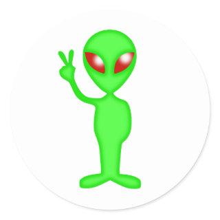 Green alien silhouette classic round sticker