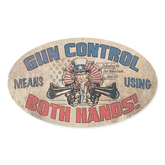 Gun Control Means Both Hands Oval Sticker