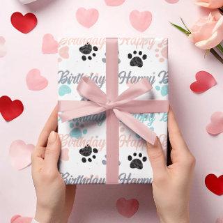 Happy birthday text, dog paw prints pattern